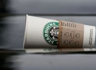 Starbucks to Close Underperforming Stores, Cut 900 Jobs in $1