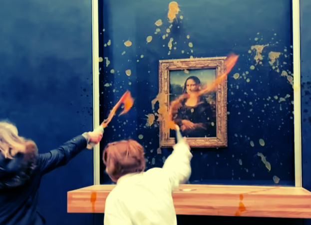 Climate activists hurl a can of soup at the Mona Lisa.